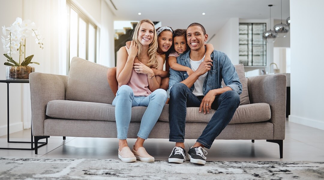 Happy family in a clean living room